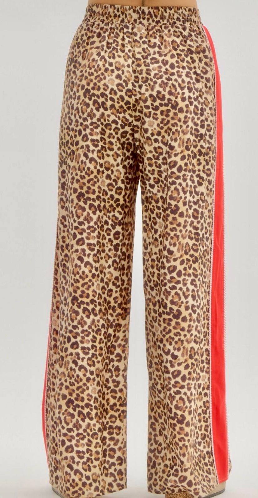 Trending leopard pants with red accented binding