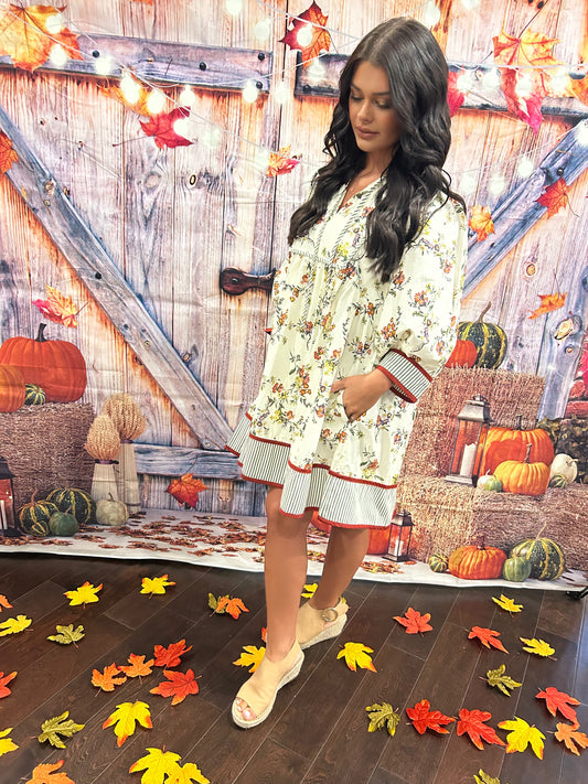 Ecru floral dress with contrast band and hem
