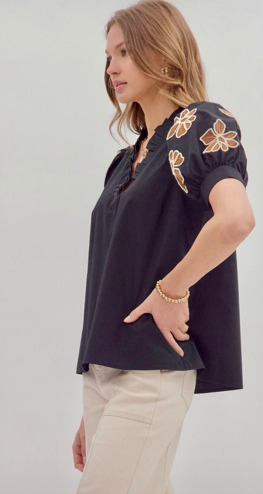 Black ruffle v-neck top with brown embroidered sleeves