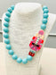 TWO FORTY TWO - HOLIDAY - Beaded Nutcracker Necklace (blue/pink)
