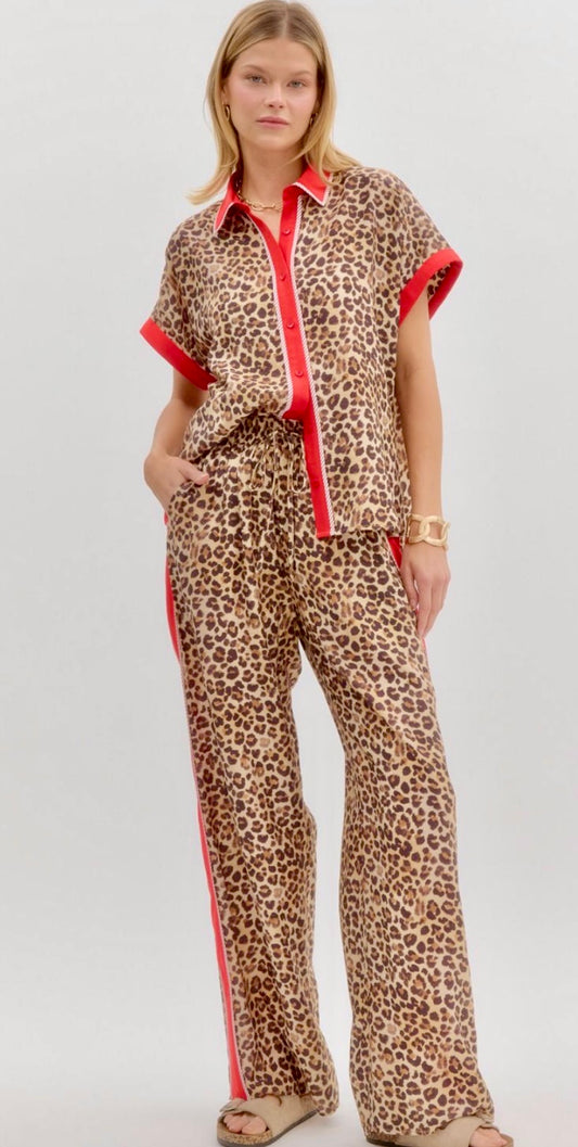 Trending leopard pants with red accented binding