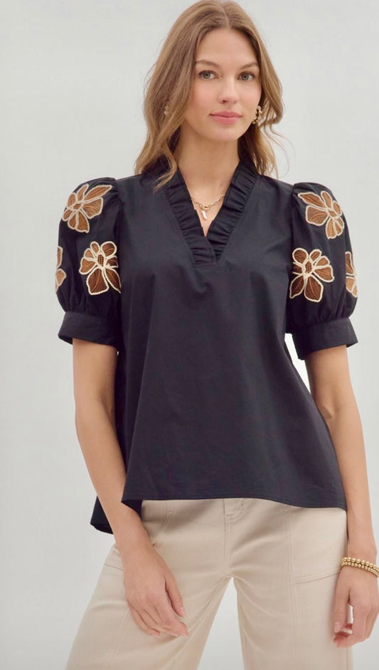 Black ruffle v-neck top with brown embroidered sleeves