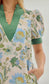 Ecru floral dress with green contrast band