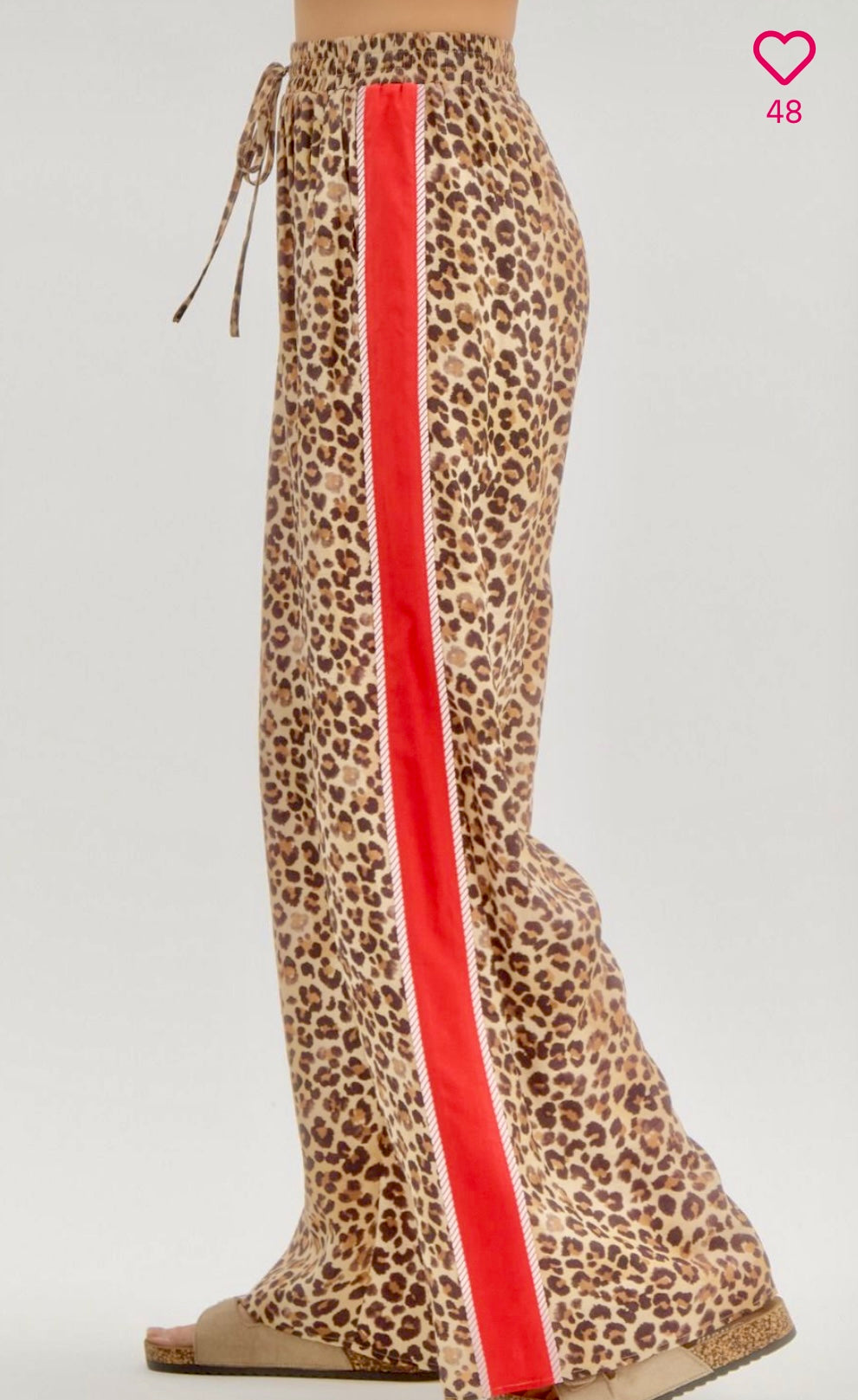 Trending leopard pants with red accented binding