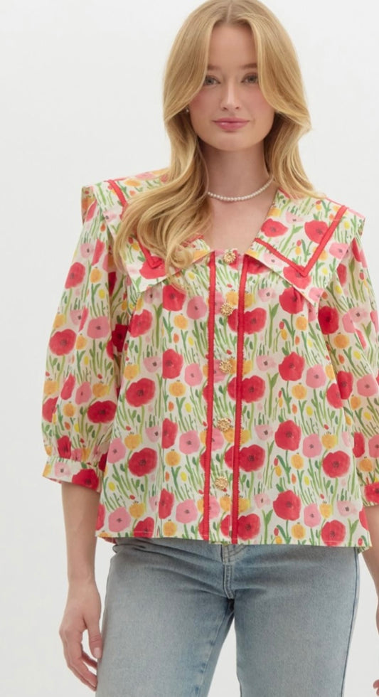 Red floral top with gold buttons