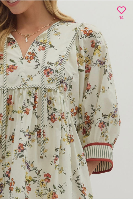 Ecru floral dress with contrast band and hem