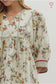 Ecru floral dress with contrast band and hem