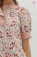 Embroidered top in Brick