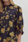 Black floral dress with pleated sleeves