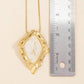 Molten Frame Marbled Stone Pendant Necklace
